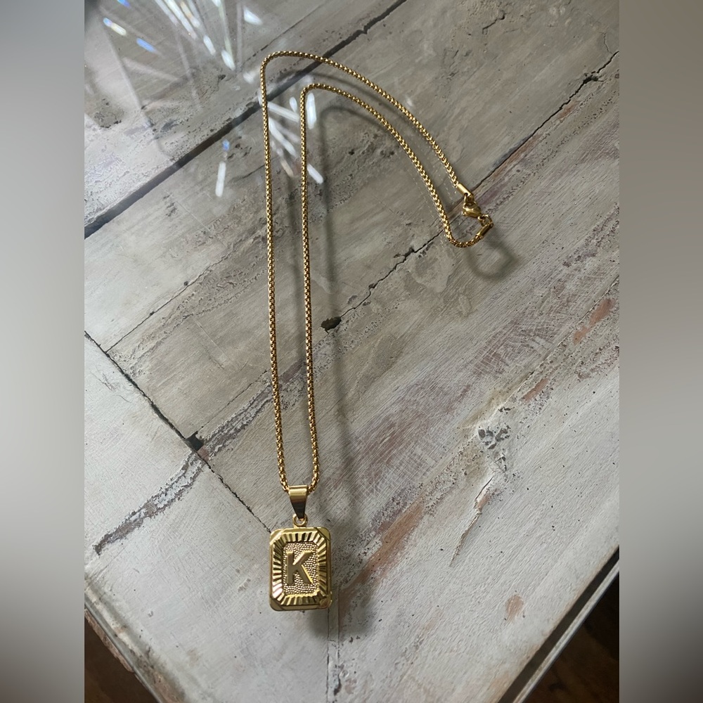 Stylish Monogram necklace K.  22 inches long.